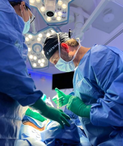 doctors operate surgery in OR