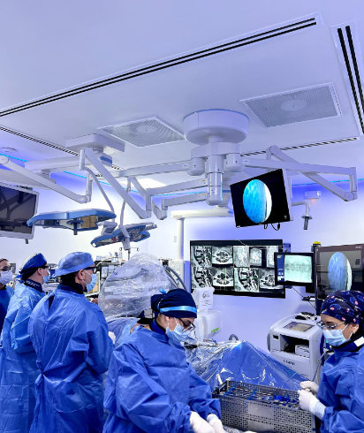 doctors operate surgery in OR